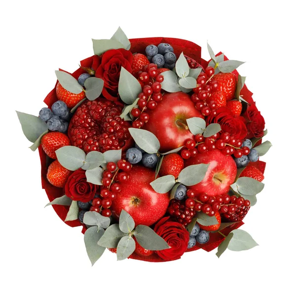 Beautiful bright red edible bouquet of fruits and flowers on a white background. Top view