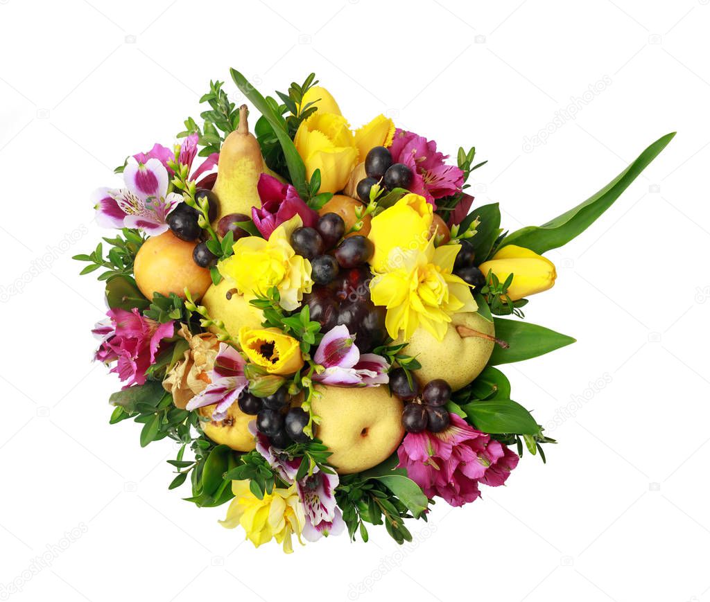 Bright bouquet of yellow and purple flowers and apples and pears stands in a vase on a white background. Top view