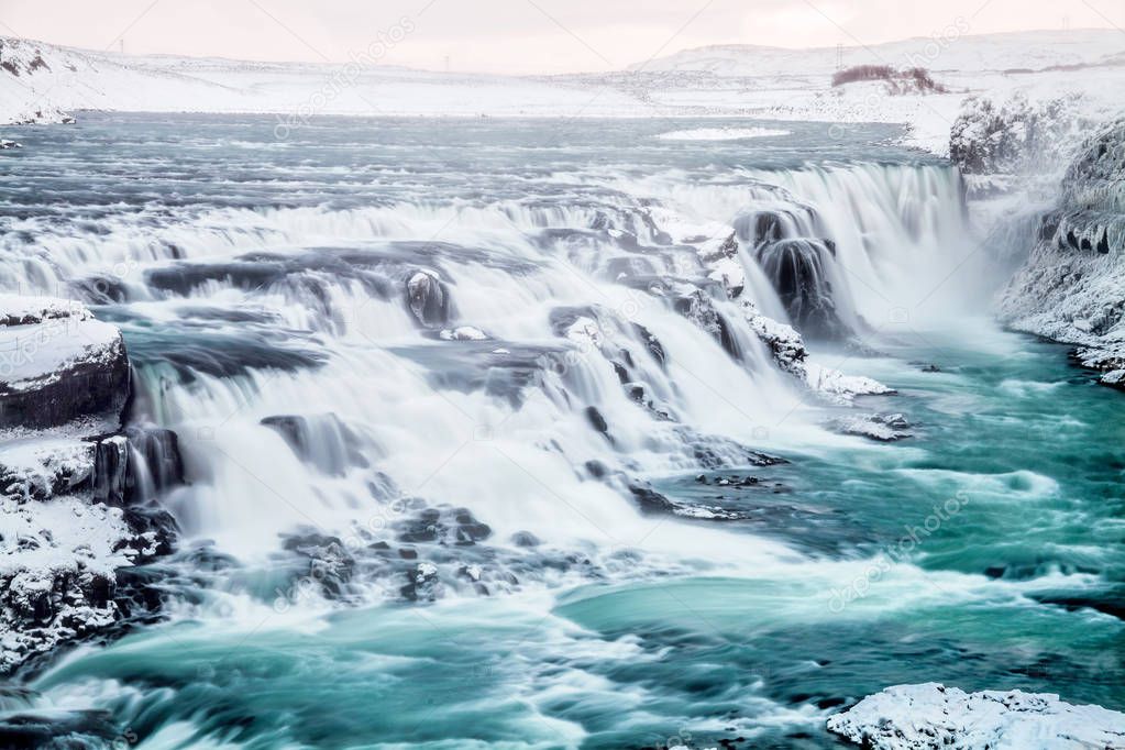 Gullfoss waterfall view in the canyon of the Hvita river during winter snow Iceland