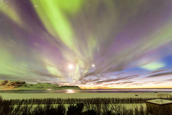 Aurora Borealis or better known as The Northern Lights for background view in Iceland, Reykjavik during winter