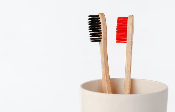 Red Black Bamboo Toothbrushes Eco Cup White Background Copy Space — Stock Photo, Image