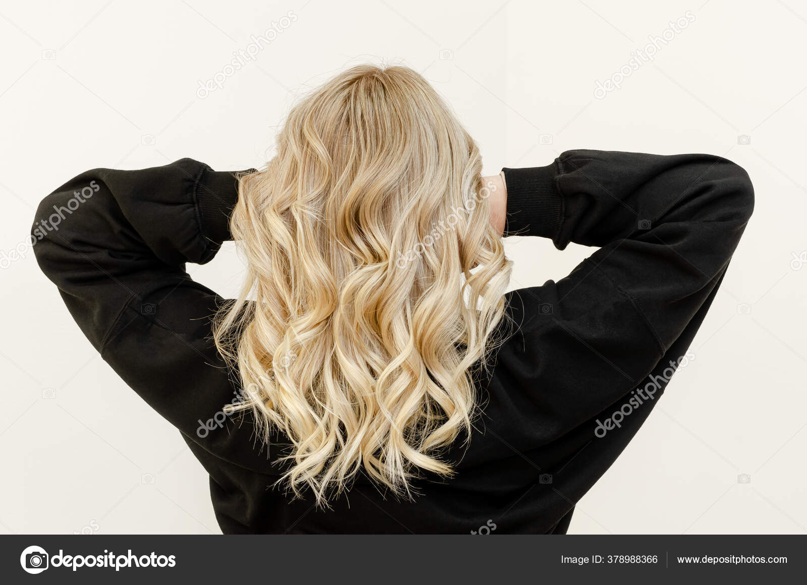 Foil on models hair. Bleaching or dyeing process. Beauty salon, fashionable  hair coloring. Copy space Stock Photo