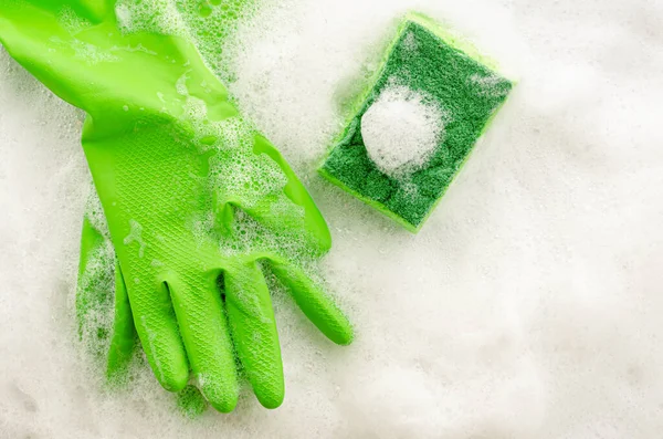 Top View Protective Green Gloves Sponge Soapy Background Housework Concept — Stock Photo, Image