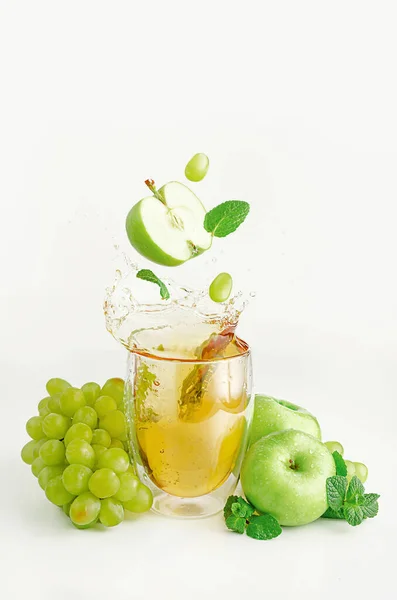 Apple Grape Mint Flying Glass Splashing Juice Biological Foods Concept — Stock Photo, Image