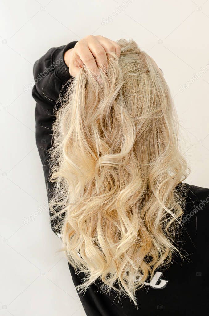 Modern trendy AirTouch technique for hair dyeing. Look from behind