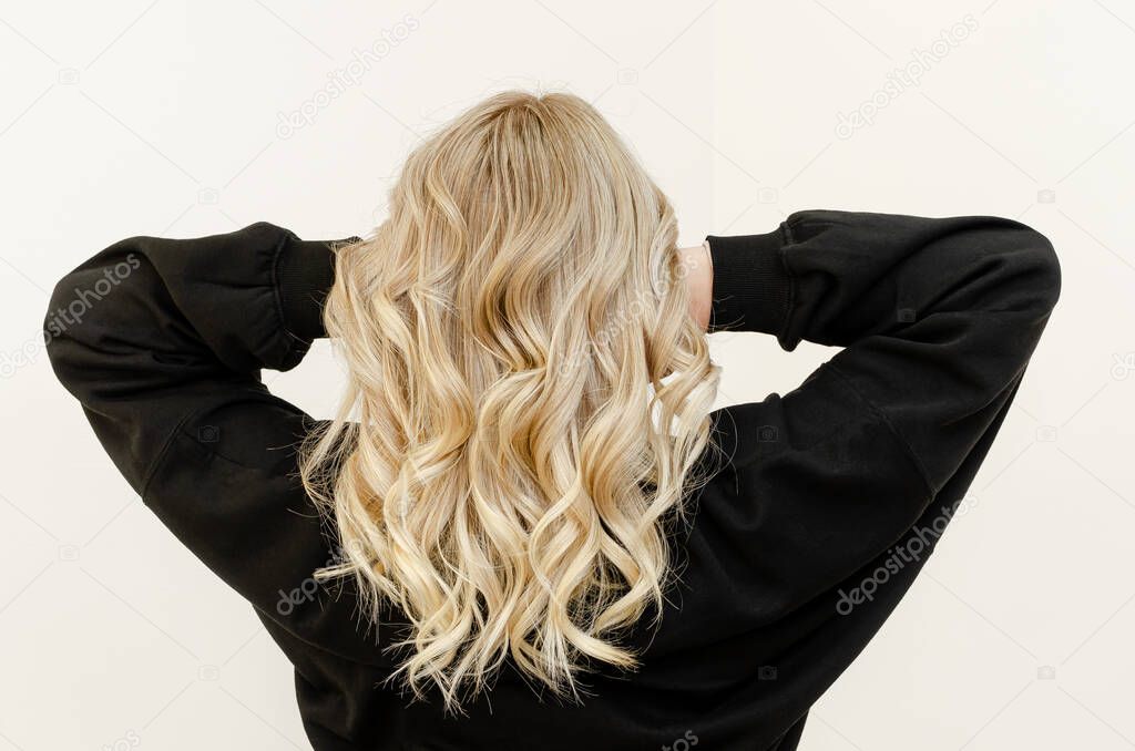 Modern trendy AirTouch technique for hair dyeing. Look from behind