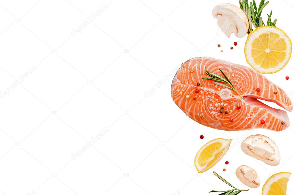 Steak of raw fresh salmon fish with mushrooms, rosemary and lemon isolated on white. Top view, keto diet and healthy eating concept. Copy space