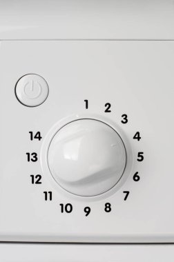 Ev aletleri konsepti. Çamaşır makinesinin kontrol panelinin bir parçası. Program seçim düğmesi.