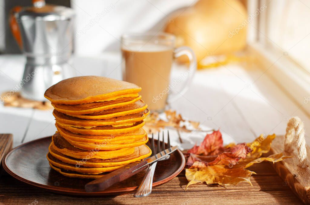 A stack of pumpkin pancakes. Healthy vegetarian food.