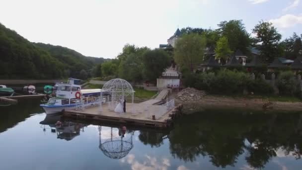 Aerial. Couple in local residential houses on Middle Harbour and moored yachts — Stock Video