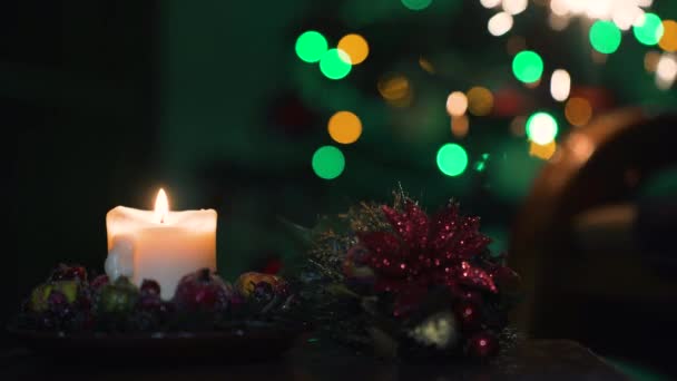 Christmas Candle and Sparks of Bengal Light on Christmas Tree. Diff. 4k — Stock Video