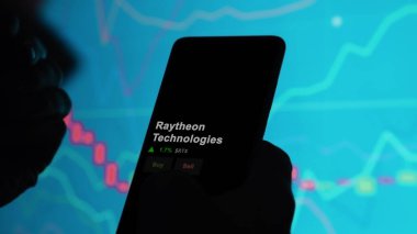 January 15th 2024. The logo of Raytheon Technologies on the screen of an exchange. Raytheon Technologies price stocks, $RTX on a device. clipart