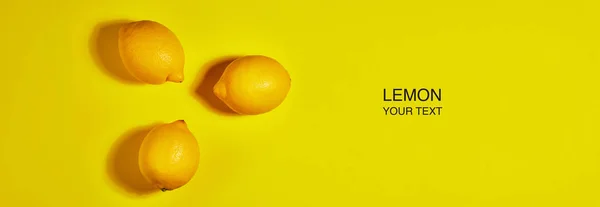 Diseño creativo hecho de limón sobre fondo amarillo. Piso tendido, vista superior, espacio para copiar. Concepto alimenticio . — Foto de Stock