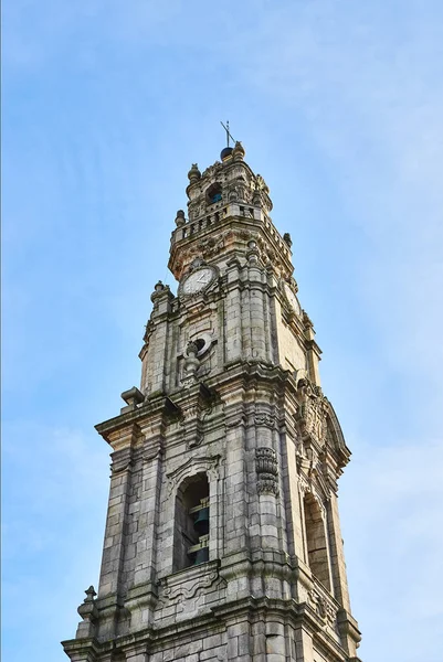 Porto, Portugal -10 December, 2018: Bell tower of the Clerigos Church (Torre dos Clerigos) in blue sky background, is one famous panoramic viewpoint destination of Porto city, Portugal — Stock Photo, Image