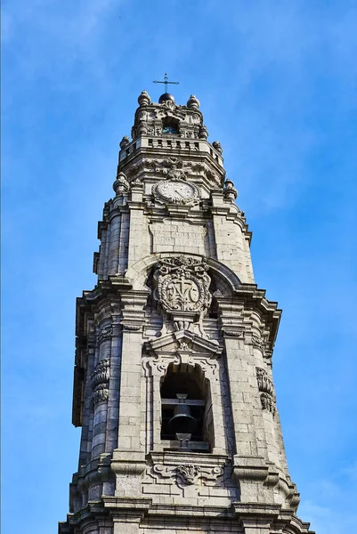 Porto, Portugal -10 December, 2018: Bell tower of the Clerigos Church (Torre dos Clerigos) in blue sky background, is one famous panoramic viewpoint destination of Porto city, Portugal — Stock Photo, Image