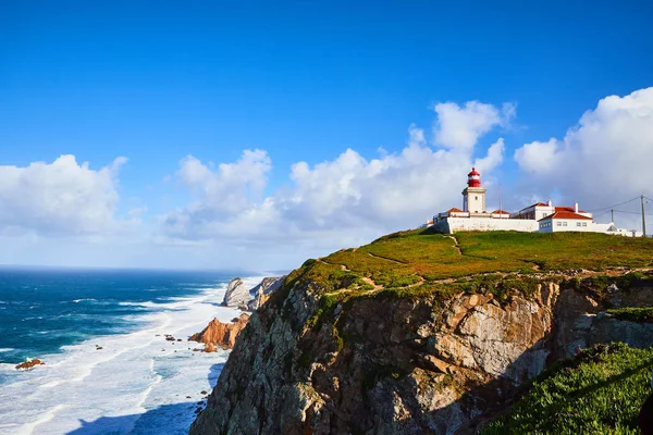 Cabo da Roca, Portugal. Lighthouse and cliffs over Atlantic Ocean, the most westerly point of the European mainland.