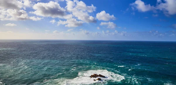 Cabo da Roca, Portugal. Lighthouse and cliffs over Atlantic Ocean, the most westerly point of the European mainland.