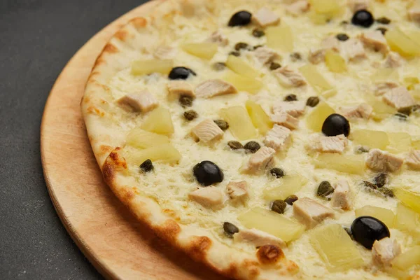 Delicious Italian pizza Hawaiian with pineapple and chicken