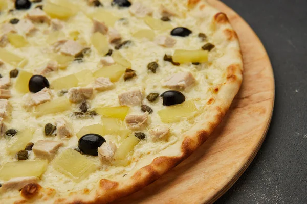 Delicious Italian pizza Hawaiian with pineapple and chicken