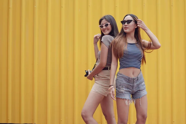 Young Asian Joyful Couple Women Summer Fashion Suite Standing Yellow — Stock Photo, Image