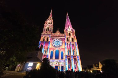 Building facade light festival Chartres in France clipart