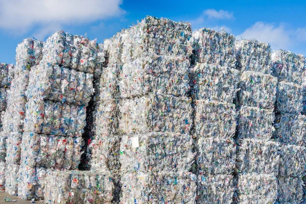 Plastics recycling centers and raw material — Stock Photo, Image