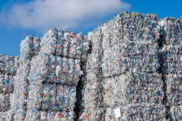 Plastics recycling centers and raw material — Stock Photo, Image