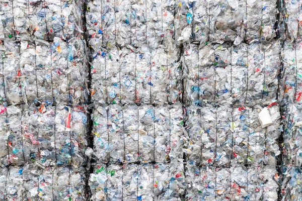 Plastics recycling centers and raw material — Stock Photo, Image