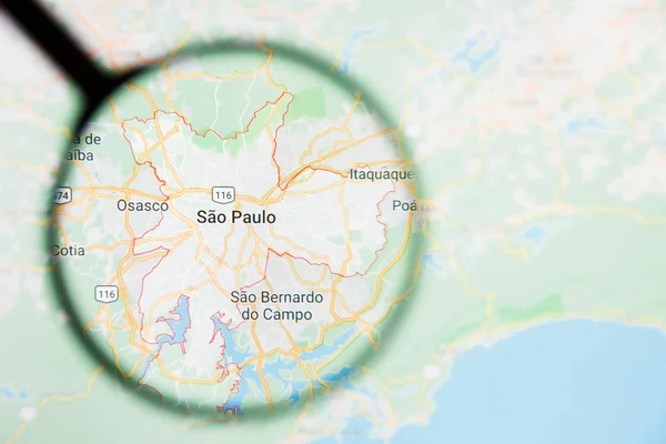 Sao Paulo, Brazil city visualization illustrative concept on display screen through magnifying glass — Stock Photo, Image