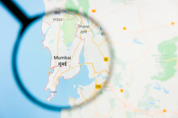 Mumbai, India city visualization illustrative concept on display screen through magnifying glass — Stock Photo, Image