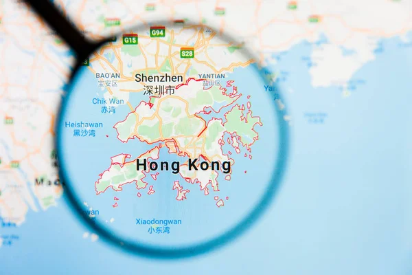 Hong Kong city visualization illustrative concept on display screen through magnifying glass — Stock Photo, Image