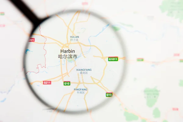 Haerbin ville visualisation concept illustratif sur écran d'affichage à travers loupe — Photo