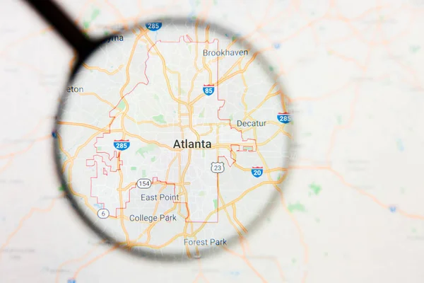 Atlanta city visualization illustrative concept on display screen through magnifying glass — Stock Photo, Image