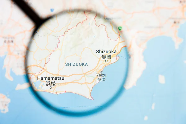Shizuoka, Japon visualisation de la ville concept illustratif sur écran d'affichage à travers loupe — Photo