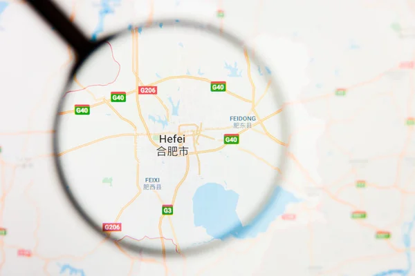 Hefei, China city visualization illustrative concept on display screen through magnifying glass — Stock Photo, Image