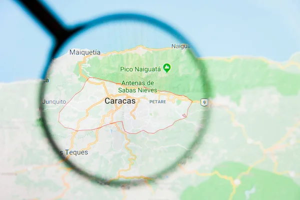 Caracas, Venezuela city visualization illustrative concept on display screen through magnifying glass — Stock Photo, Image