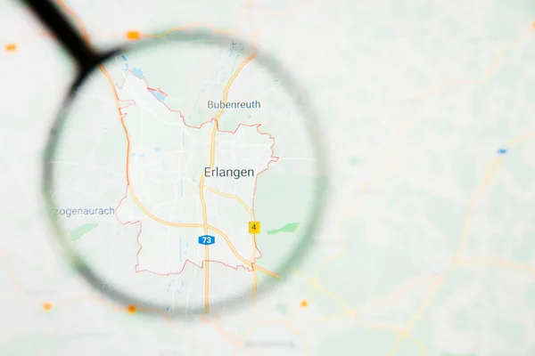 Erlangen city in Germany, Bavaria visualization illustrative concept on display screen through magnifying glass — Stock Photo, Image