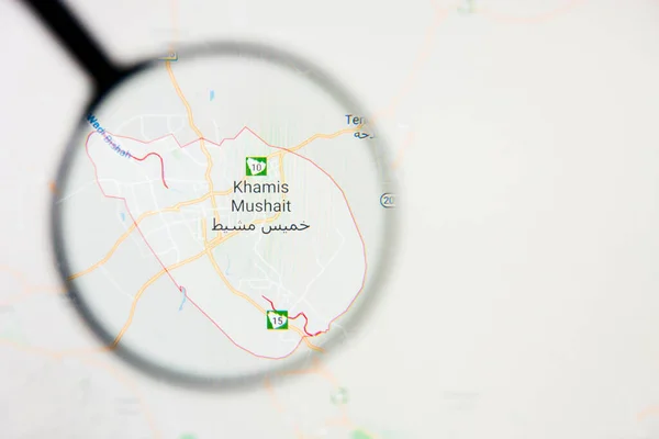 Khamis Mushait city visualization illustrative concept on display screen through magnifying glass — Stock Photo, Image