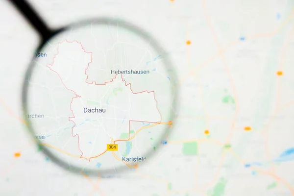 Dachau city in Germany, Bavaria visualization illustrative concept on display screen through magnifying glass — Stock Photo, Image