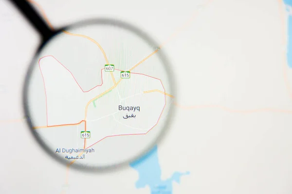 Abqaiq city in Saudi Arabia visualization illustrative concept on display screen through magnifying glass — Stock Photo, Image