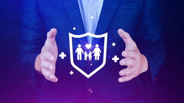 Insurance concept, Businessman with protective gesture and family, life, health and house insurance icons, Family life insurance and policy concepts, hospital, medical treatment.