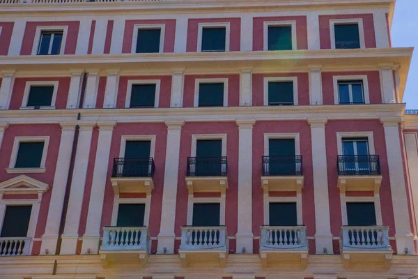 Genoa, summer streets, exterior details on the streets, roofs, lights and doors, windows, Genoa roads. Plaza Christopher Columbus, parks, Museum of Genoa, ports of anglers. Genova italian Madonna sculpture frescoes on houses