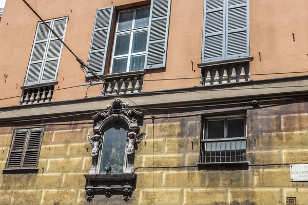 Genoa, summer streets, exterior details on the streets, roofs, lights and doors, windows, Genoa roads. Plaza Christopher Columbus, parks, Museum of Genoa, ports of anglers. Genova italian Madonna sculpture frescoes on houses, velocity tour