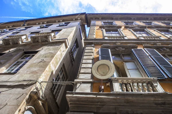 Genoa, summer streets, exterior details on the streets, roofs, lights and doors, windows, Genoa roads. Plaza Christopher Columbus, parks, Museum of Genoa, ports of anglers. Genova italian Madonna sculpture frescoes on houses, velocity tour