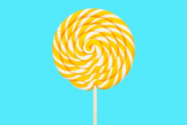 Yellow twisted lollipop on a blue background clipart
