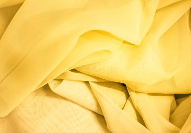 Parlak sarı kumaş dokusu