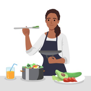 Önlüklü, gülümseyen genç bir kadın karakter mutfakta duruyor ve sebzeleri kesiyor. Düz vektör çizimi beyaz arkaplanda izole edildi