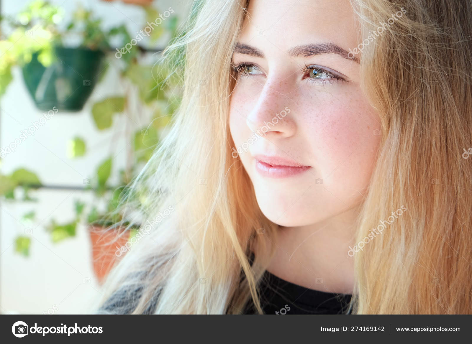 Beautiful Teen Girl With Blond Hair Green Eyes And Freckles