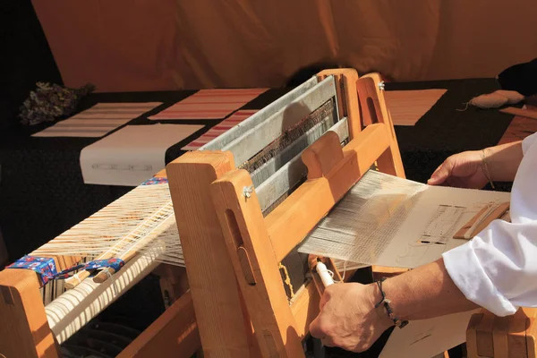 Fabric handmade machine. Loom for makes silk homespun.