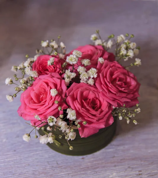 Colorful roses at flower shop. side view